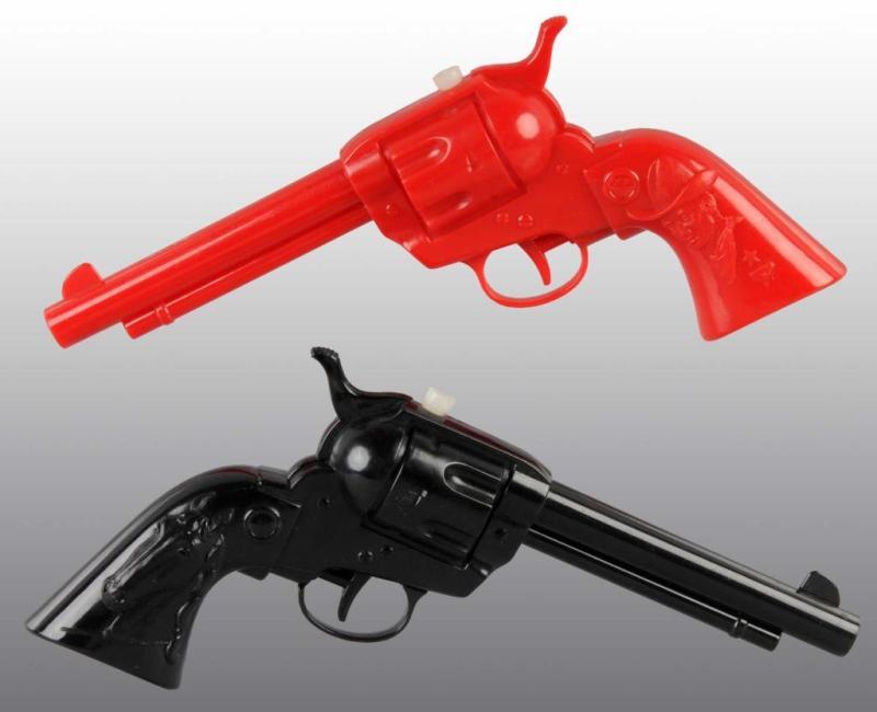 Appraisal: Lot of Plastic Western-Style Toy Water Guns Description One red