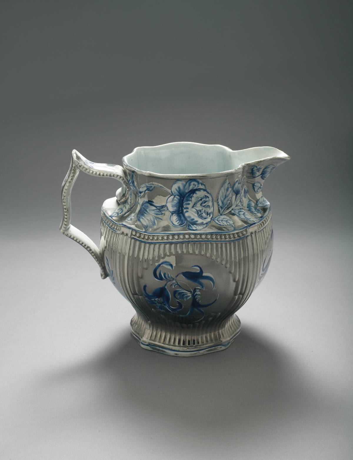 Appraisal: STAFFORDSHIRE SILVER LUSTRE AND BLUE ENAMEL-DECORATED JUG CIRCA - The