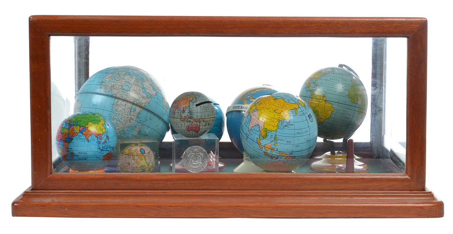 Appraisal: A COLLECTION OF NOVELTY ''WORLD GLOBE'' MONEY BOXES IN A