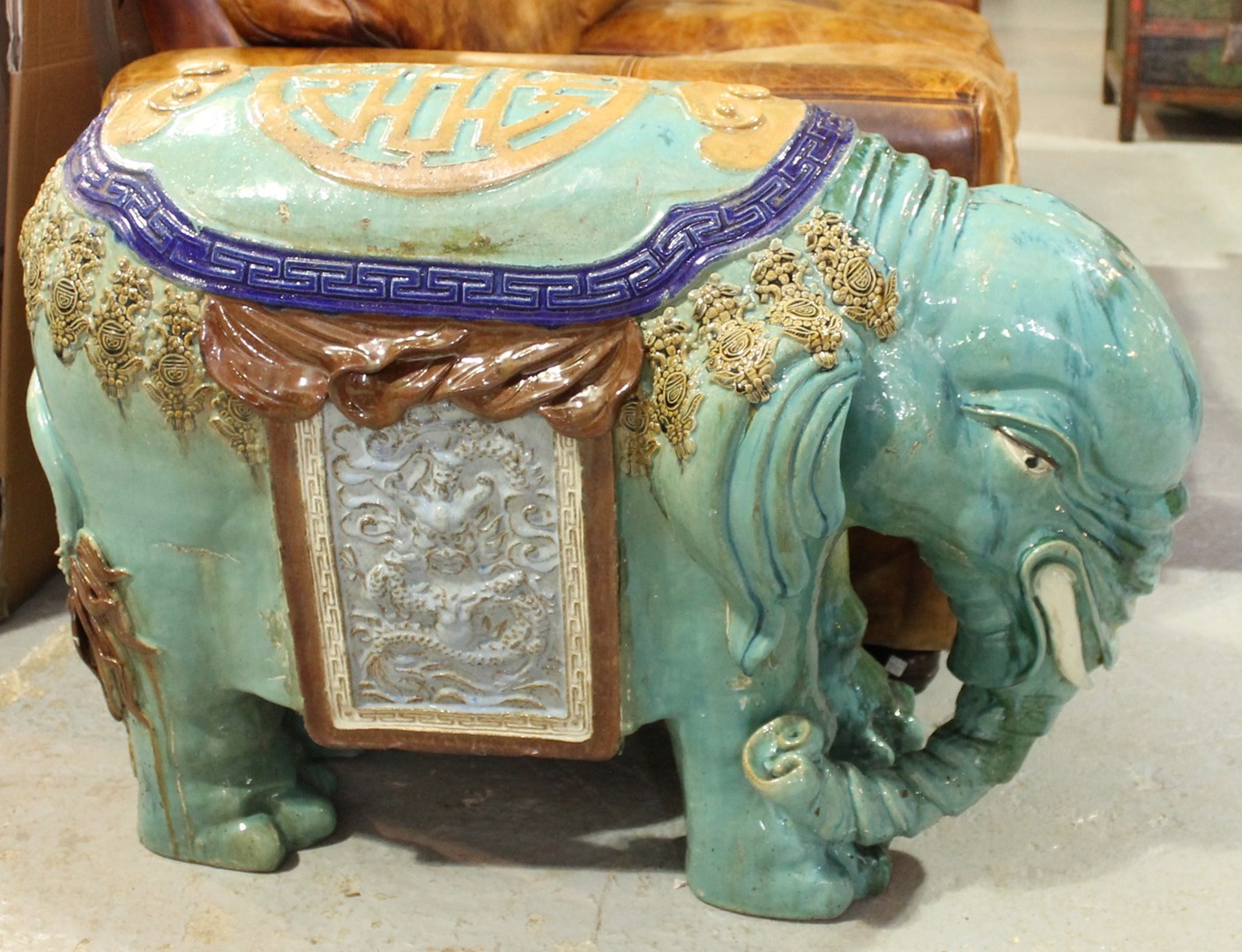 Appraisal: A large pair of glazed ceramic elephants in standing pose