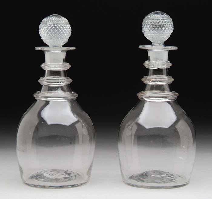 Appraisal: PAIR OF CLEAR BLOWN THREE RING GLASS DECANTERS Each having