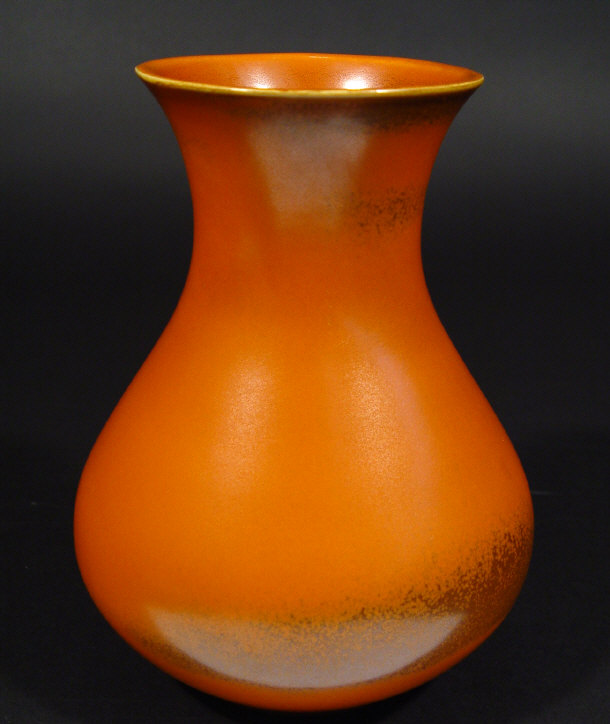 Appraisal: Lancastrian vase decorated in an orange glaze printed factory mark