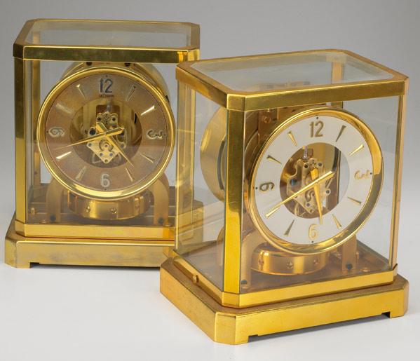 Appraisal: LECOULTRE ATMOS CLOCKS Grouping of two in brass and glass