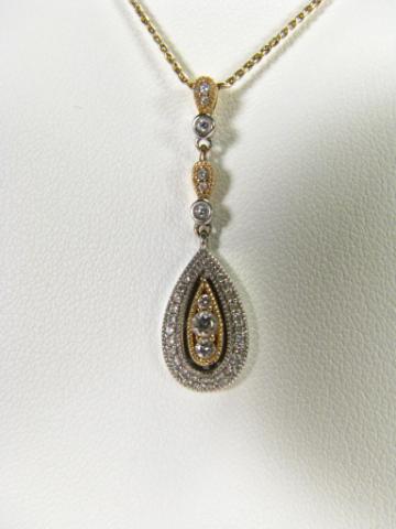 Appraisal: K Two Tone Bezel set and accent Diamonds Pendant in