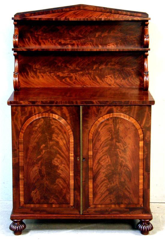 Appraisal: Early th century mahogany and crossbanded chiffonier with open shelves