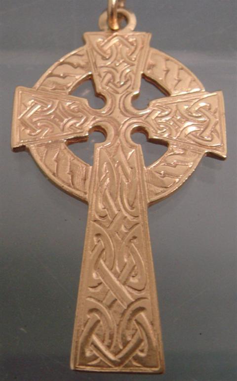 Appraisal: K YG Celtic cross with engraved decoration obverse with presentation