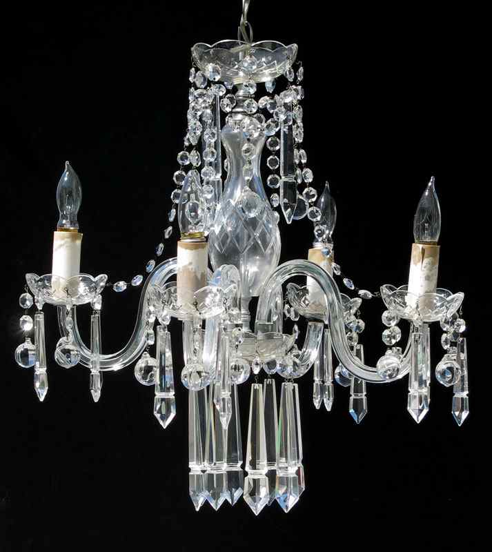 Appraisal: A PETITE CRYSTAL CHANDELIER light bent crystal arms garlands and