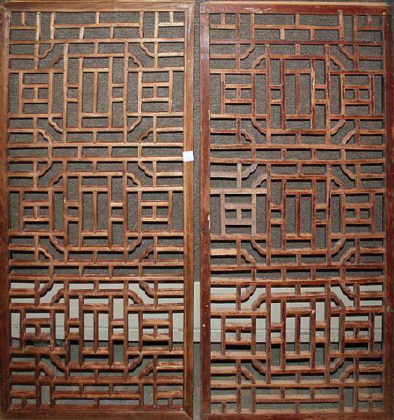 Appraisal: A pair of Chinese pieced lattice-wood windows Late Qing Republic