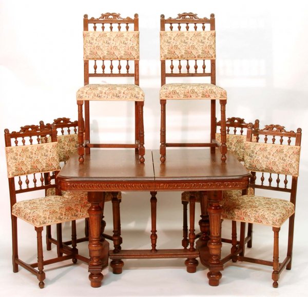 Appraisal: Dining set Table with six chairs Table with carved skirt