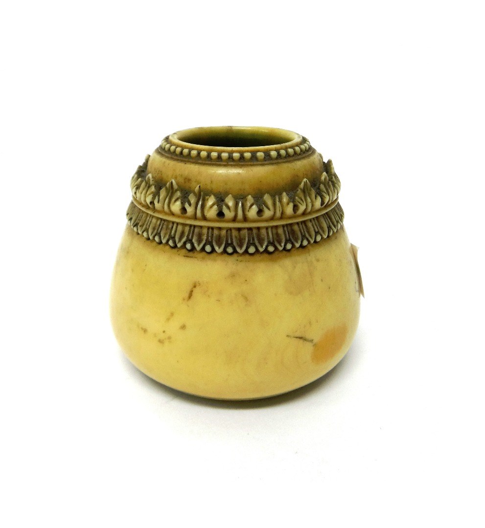 Appraisal: An Indian ivory inkwell th century of conical form carved