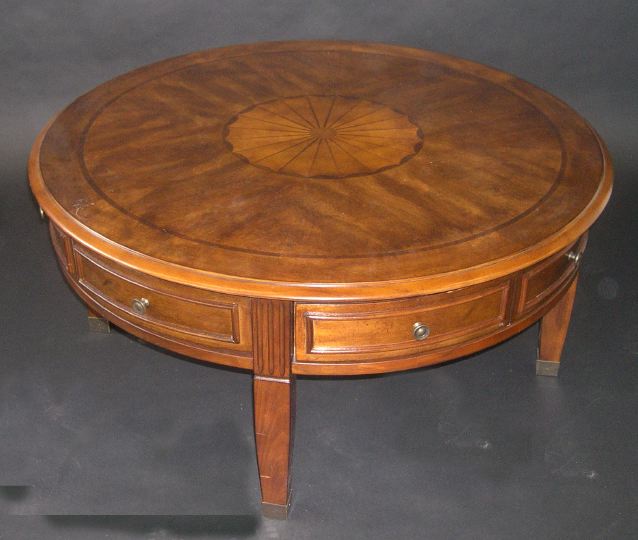 Appraisal: George III-Style Mahogany Coffee Table the circular banded top with