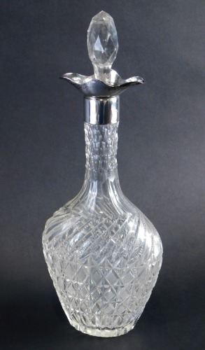 Appraisal: An Edward VII cut glass and silver decanter with a