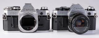 Appraisal: Two Canon AE- mm cameras with one Canon FD mm