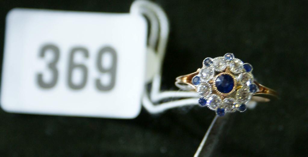 Appraisal: A sapphire and diamond cluster ring with floral cluster set