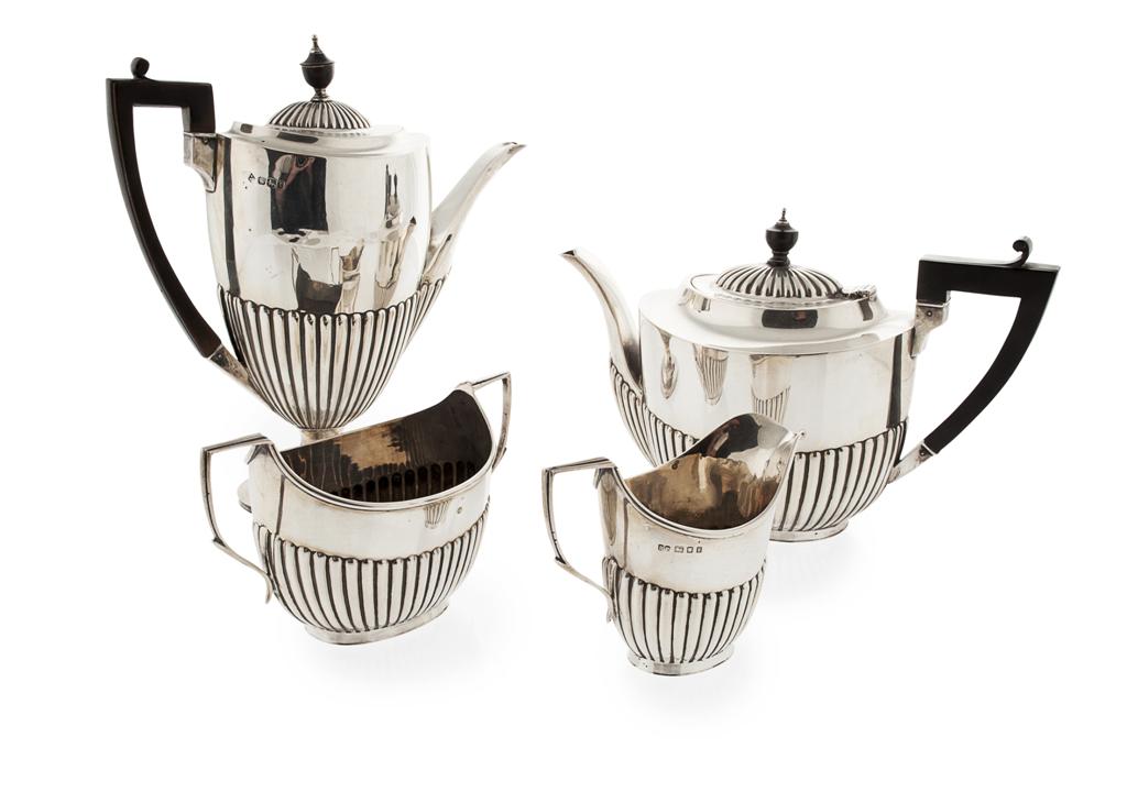 Appraisal: A matched tea and coffee set circa of oval form