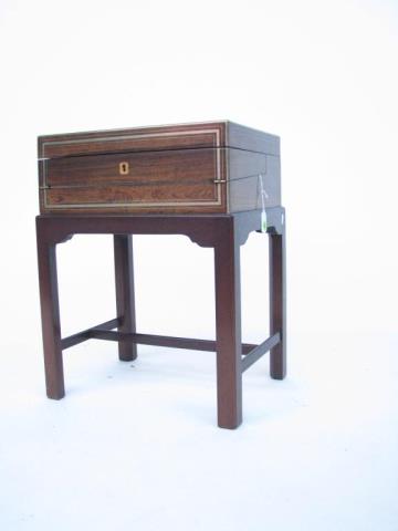 Appraisal: An antique English rosewood lap desk with brass banding fitted