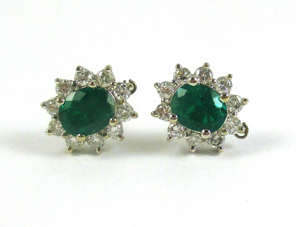 Appraisal: PAIR OF EMERALD AND DIAMOND STUD EARRINGS each k white