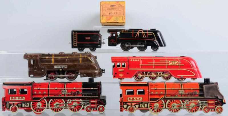 Appraisal: Lot of Tinplate French Toy Train Items Includes six engines