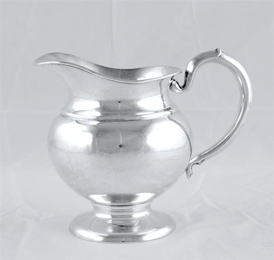 Appraisal: American sterling beverage pitcher bulbous pedestaled urn with wide spout