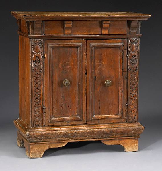 Appraisal: An Italian Baroque walnut small credenza primarily th century The