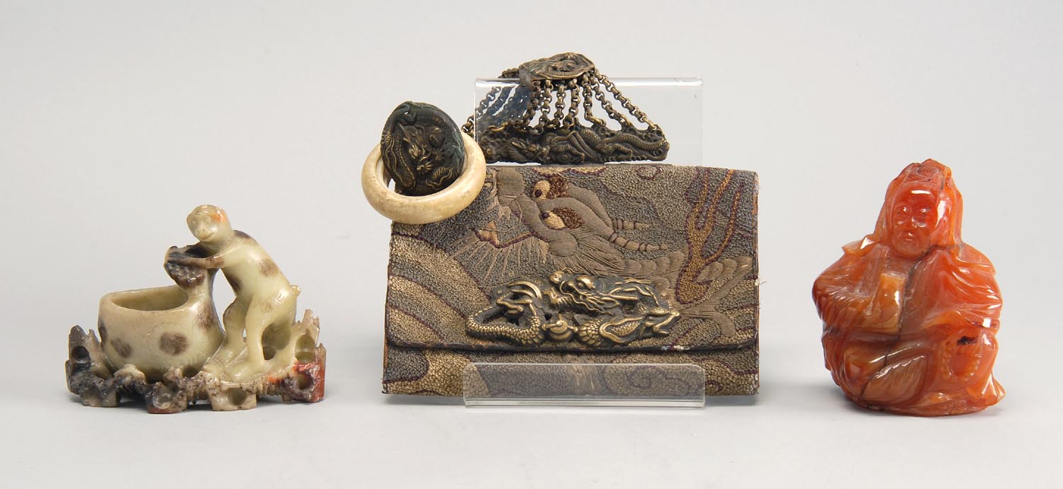 Appraisal: THREE ORIENTAL ARTIFACTS carnelian agate figure of Buddha soapstone monkey