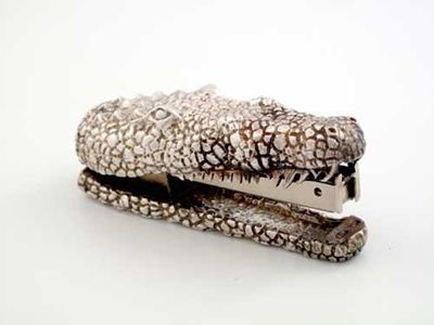 Appraisal: A modern contemporary cast stapler in the form of a