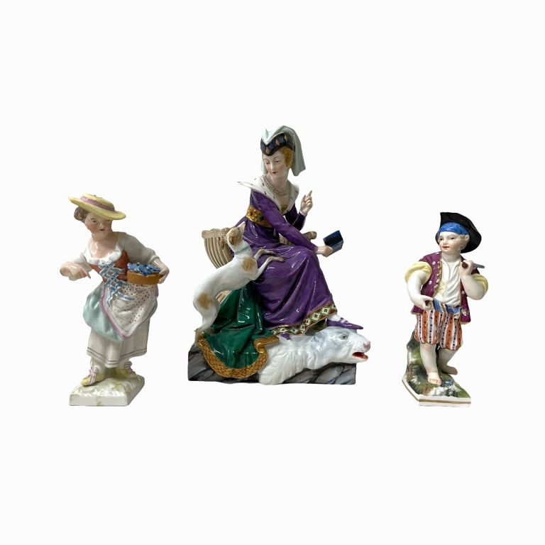 Appraisal: Porcelain Figurines Mother with dog and children figurines Good condition