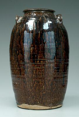 Appraisal: Alkaline glaze stoneware jar two applied ears runny dark brown