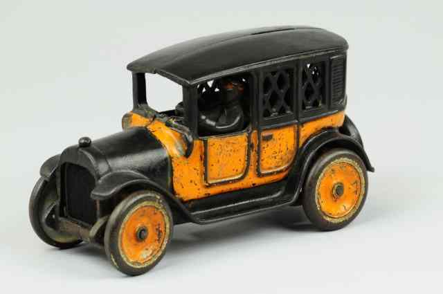 Appraisal: ARCADE YELLOW CAB BANK Cast iron painted in orange and