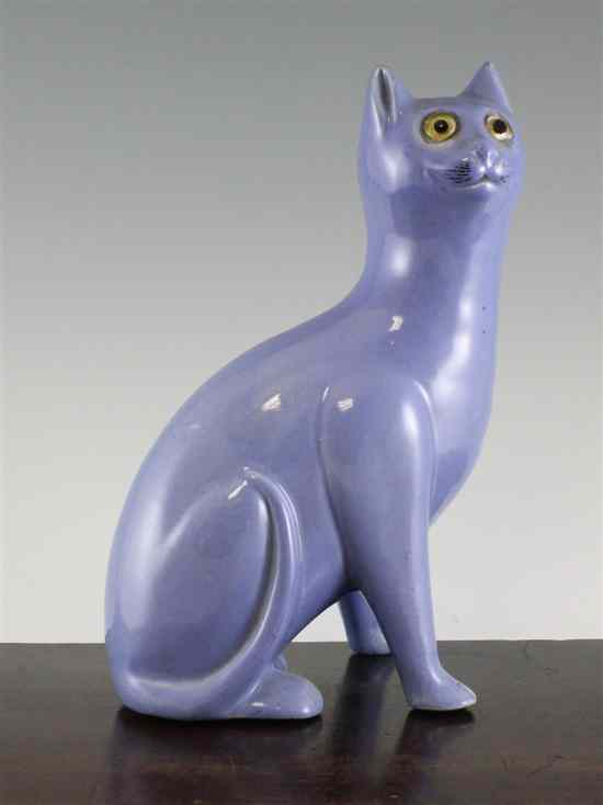 Appraisal: A Bretby lavender blue glazed model of a seated cat