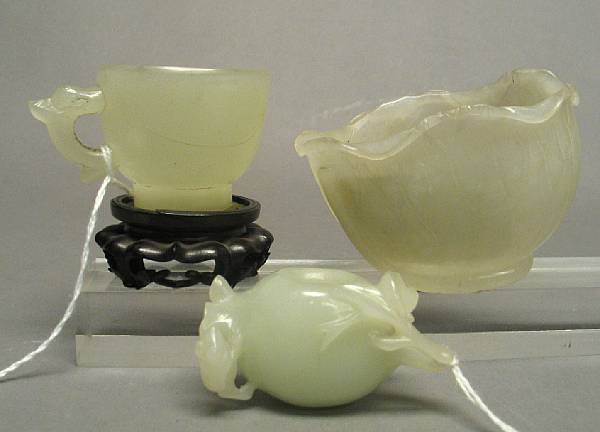 Appraisal: Three small jade carvings Including a white jade water coupe