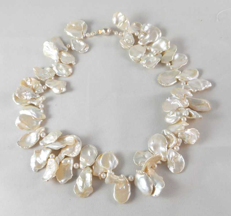 Appraisal: PRINCESS LENGTH WHITE PEARL NECKLACE measuring - inches in length