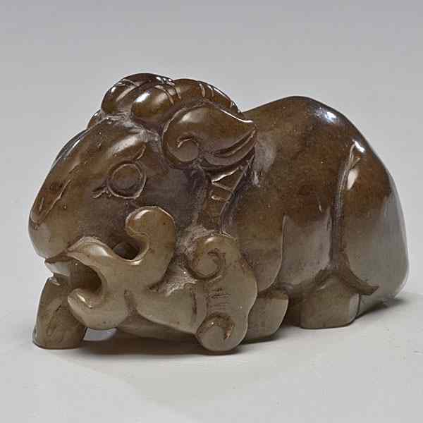 Appraisal: Chinese Carved Jade Ram Chinese th century a flush brown