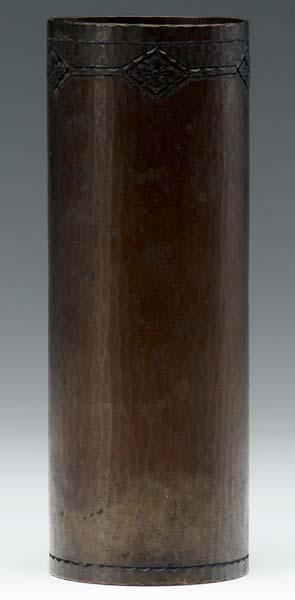 Appraisal: ROYCROFT Hammered copper cylindrical vase with banded quatrefoil design around