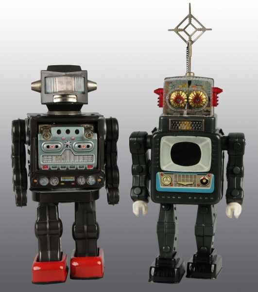 Appraisal: Lot of Tin Robot Battery-Operated Toys Description Japanese Working Includes