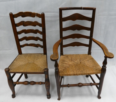 Appraisal: Two Country Ladder back chairs rush seated chairs