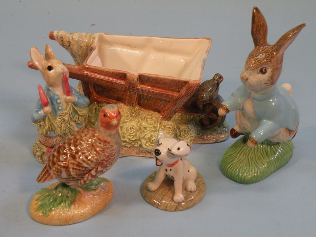 Appraisal: A Beswick model of 'Peter Rabbit' dated a grouse bearing