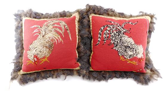 Appraisal: Two similar th C down feather pillows red needlepoint covers