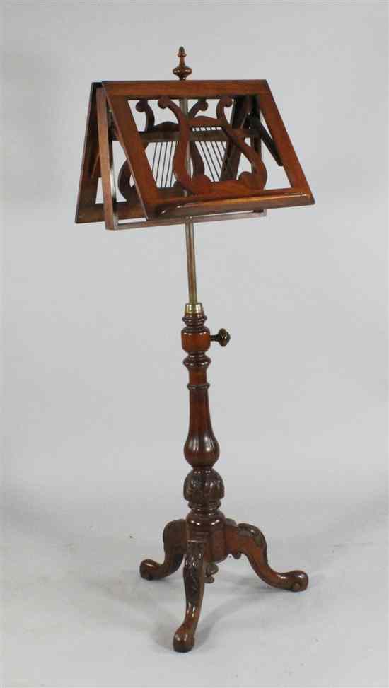 Appraisal: A Victorian carved mahogany adjustable duet music stand on fluted