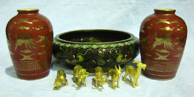 Appraisal: A Chinese cloisonn bowl enriched with dragons character mark to