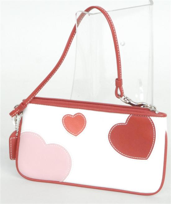 Appraisal: A PETITE COACH PURSE In white red and pink leather