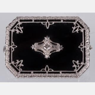 Appraisal: A kt White Gold Onyx and Diamond Brooch A kt