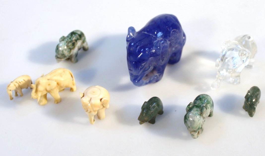 Appraisal: Various thC polished stone animal figurines jade coloured elephant cm