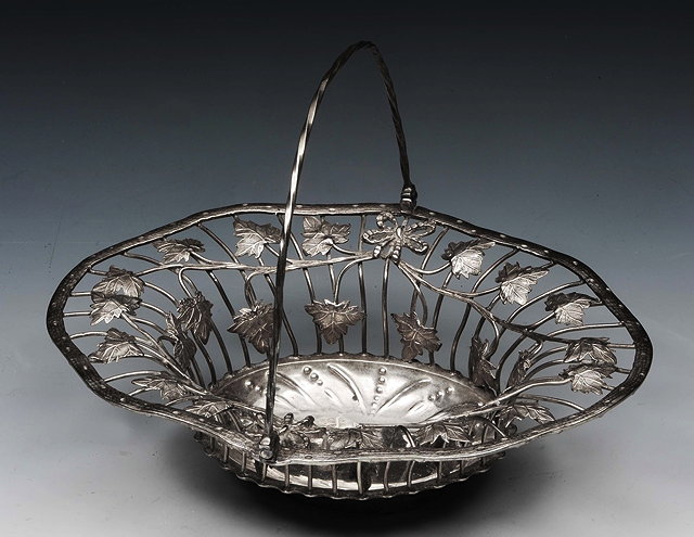 Appraisal: A GEORGIAN SILVER BASKET with wirework bowl applied with vine