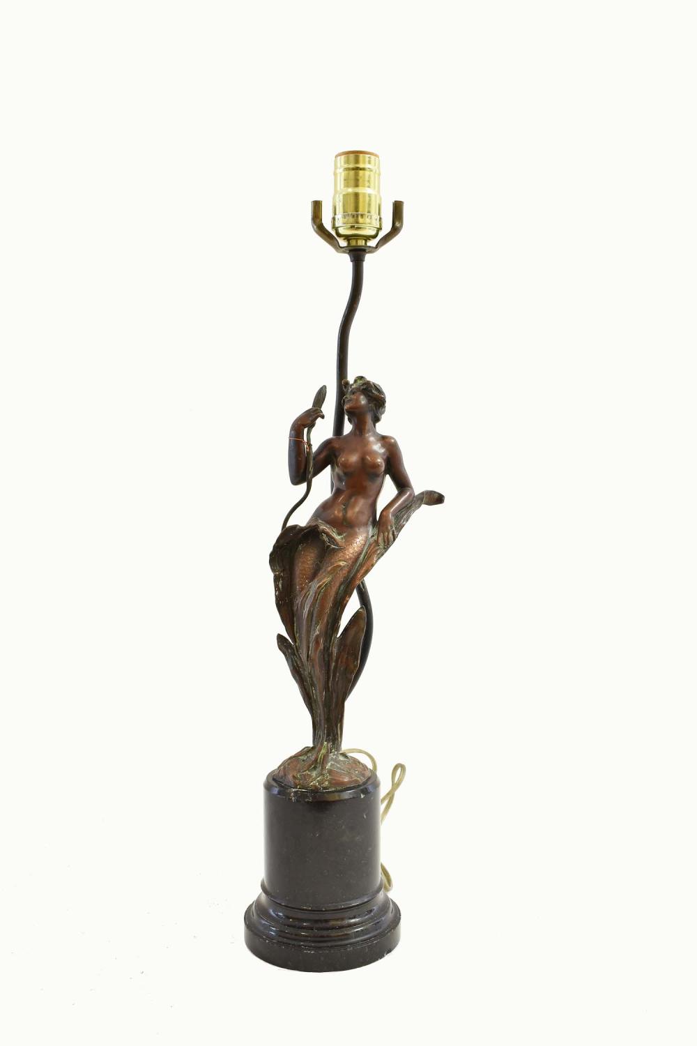 Appraisal: ART NOUVEAU PATINATED BRONZE OF A MAIDEN MOUNTED AS A