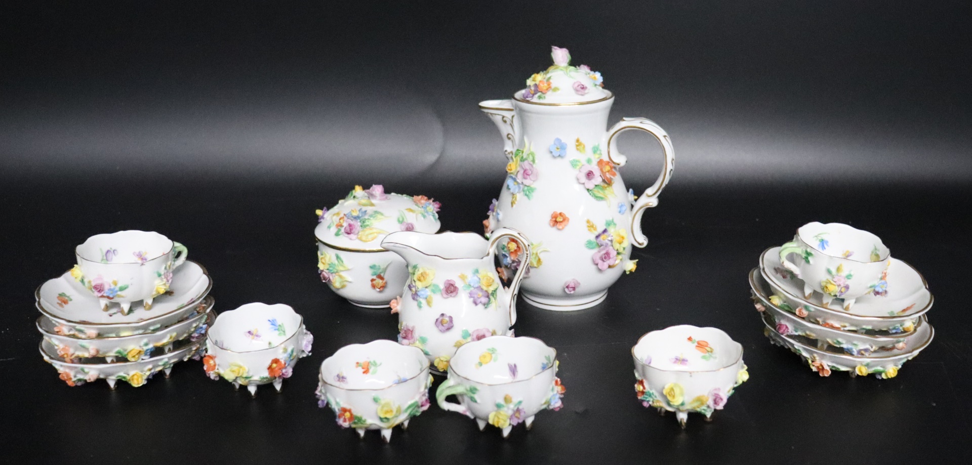 Appraisal: Dresden Porcelain Demitasse Set To include tea pot H saucers