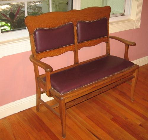 Appraisal: LATE VICTORIAN OAK SETTLE Open arm settle with new leather