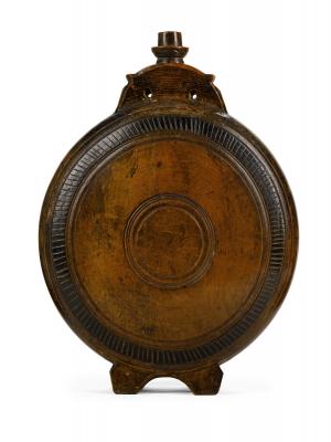 Appraisal: An early th Century wooden water flask of large proportions