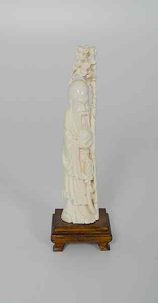 Appraisal: Chinese Carved Ivory Figurine China A carved ivory figurine of