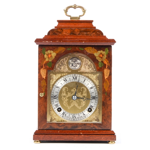 Appraisal: A walnut and marquetry mantle clock F W Elliott Ltd